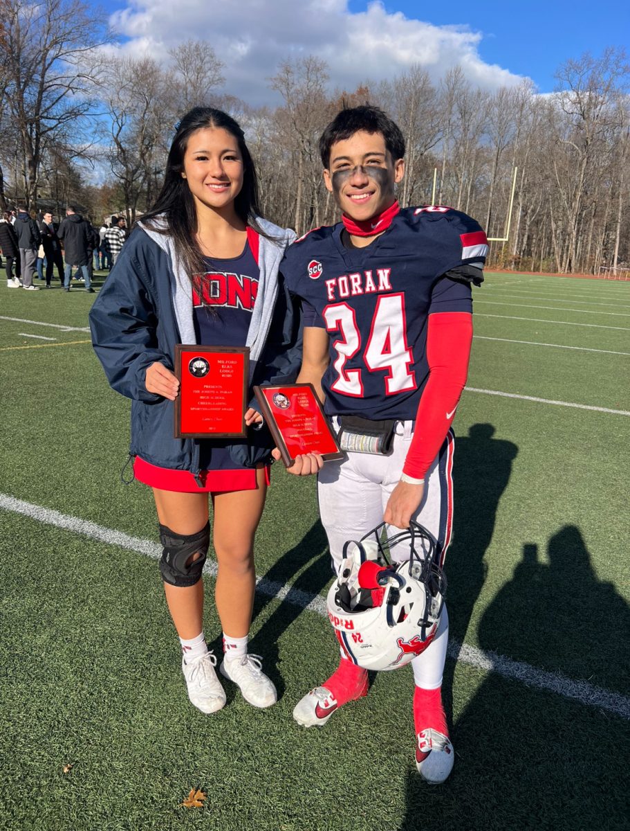 Winning the Award: Laney and Landon Chan holding the Milford Elks Sportsmanship Award, November 27, 2025. Photo courtesy: Sarah Chan. 