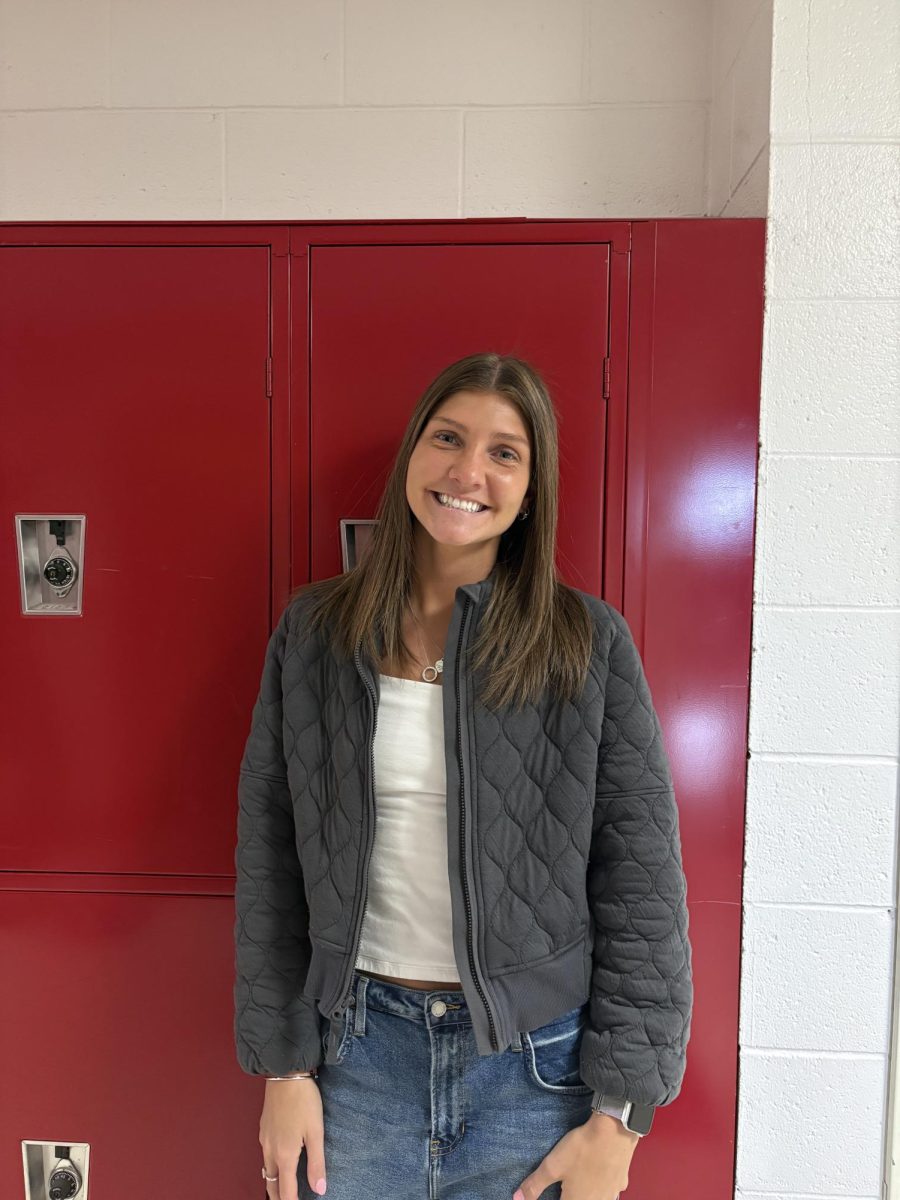 No Filter Needed: Health Teacher Ms. Megan Hosking in the red hall radiating confidence. February 2, 2025. Photo courtesy: Lalana Carroll.