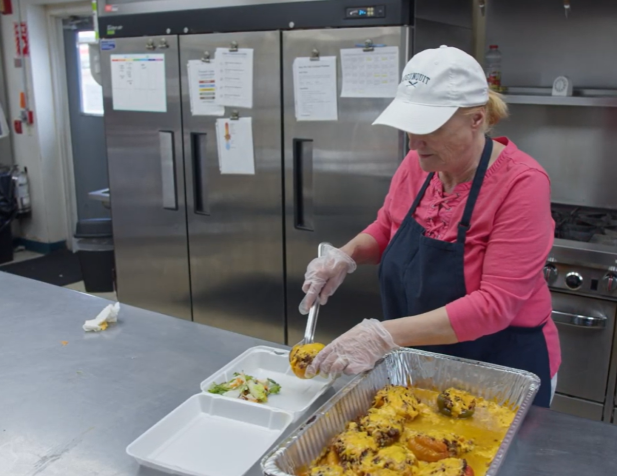 Community kitchen: Community Kitchen Manager, Carolyn Miller, cooking for shelter, March 31, 2026. Photo courtesy: Jenna Brooke.