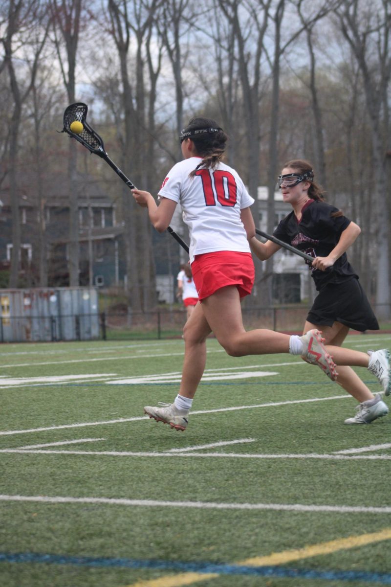 On the Hunt of a Goal: Sophomore Sofia Gallardo runs down the field in an attempt to score a goal for Foran, April 17, 2026. Photo courtesy: Gianna Bellon