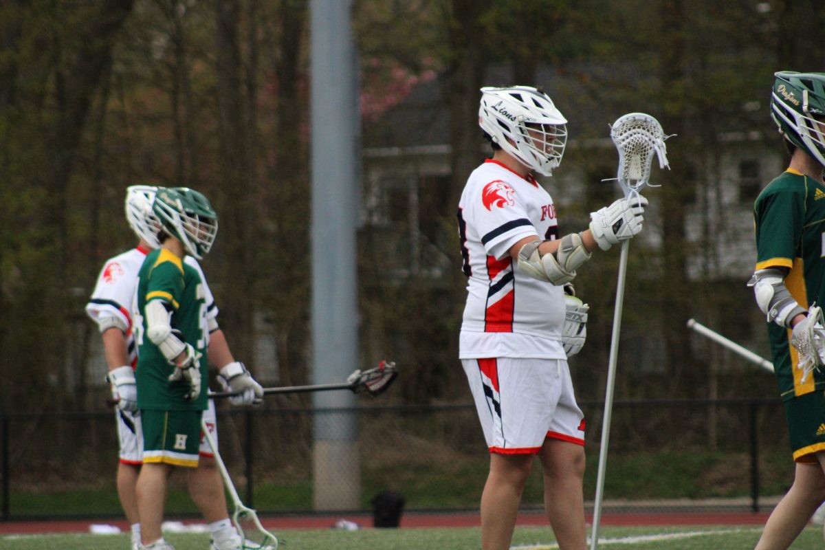 Watching the Goal: Ethan Dworski (Middle) Watching his teammates get the ball into the goal, April 28, 2026.Photo Courtesy: Maya Krzywosz