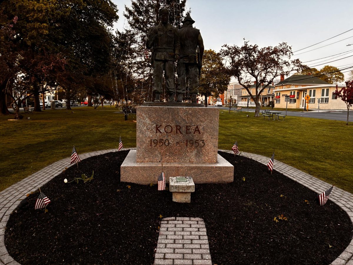 Korean War Unity Memorial: Korean War memorial (1950-1953) honoring U.S. soldiers, with two figures on a stone base and American flags, May 4, 2026, Photo Courtesy: Tyler McTigue.